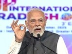 Prime Minister Narendra Modi addresses the 3rd edition of the UP International Trade show, in Gautam Buddha Nagar, on Thursday (ANI Video Grab)