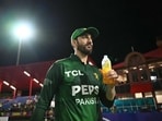 Pakistan's captain Salman Ali Agha looks on after his team.
