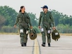 Chief of the Air Staff (CAS) Air Chief Marshal Amar Preet Singh and Flying Officer Priya Sharma walk towards a MiG-21 aircraft at the Nal Air Force Station, in Bikaner district, Rajasthan. Chief of the Air Staff (CAS) Air Chief Marshal Amar Preet Singh and Flying Officer Priya Sharma walk towards a MiG-21 aircraft at the Nal Air Force Station, in Bikaner district, Rajasthan.