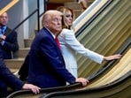 US President Donald Trump and First Lady Melania Trump ride an escalator as they arrive to attend the 80th United Nations General Assembly, in New York City, New York, U.S., September 23, 2025. 