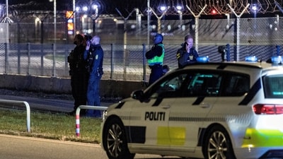 Police officers stand guard after all traffic was closed at the Copenhagen Airport due to drone reports on September 22, 2025. (File/via REUTERS)