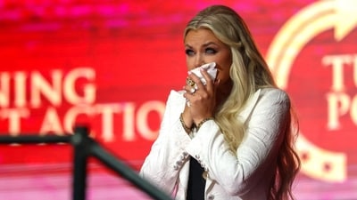 Erika Kirk wipes away tears during the memorial service for her husband, political activist Charlie Kirk at State Farm Stadium (Getty Images via AFP) Erika Kirk wipes away tears during the memorial service for her husband, political activist Charlie Kirk at State Farm Stadium (Getty Images via AFP)