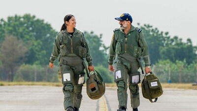 Chief of the Air Staff (CAS) Air Chief Marshal Amar Preet Singh and Flying Officer Priya Sharma walk towards a MiG-21 aircraft at the Nal Air Force Station, in Bikaner district, Rajasthan. (PTI File) Chief of the Air Staff (CAS) Air Chief Marshal Amar Preet Singh and Flying Officer Priya Sharma walk towards a MiG-21 aircraft at the Nal Air Force Station, in Bikaner district, Rajasthan. (PTI File)