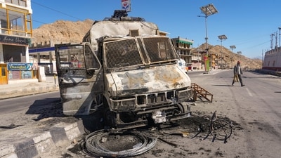 Leh: Charred remains of a vehicle lies in the aftermath of violent clashes between demonstrators and police during a protest in Leh, Thursday, Sept. 25, 2025. (PTI) Leh: Charred remains of a vehicle lies in the aftermath of violent clashes between demonstrators and police during a protest in Leh, Thursday, Sept. 25, 2025. (PTI)