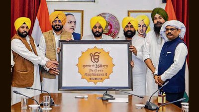 Punjab chief minister Bhagwant Mann releases a logo for state-level commemorative events to mark the 350th martyrdom day of Guru Teg Bahadur in Chandigarh on Thursday. (PTI)