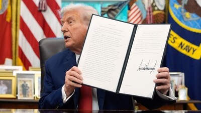 President Donald Trump holds a signed executive order regarding TikTok in the Oval Office at the White House, Thursday, Sept. 25, 2025, in Washington. (AP)