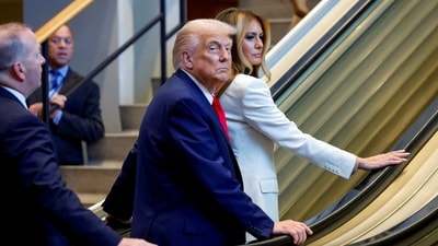 US President Donald Trump and First Lady Melania Trump ride an escalator as they arrive to attend the 80th United Nations General Assembly, in New York City, New York, U.S., September 23, 2025. (REUTERS)