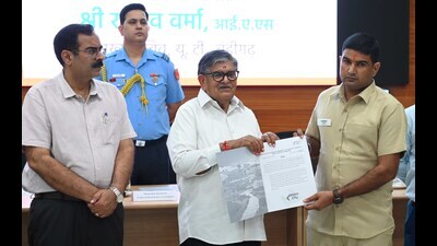 UT administrator Gulab Chand Kataria hands over an appointment letter to a newly appointed CTU bus driver in a ceremony held at UT Secretariat on Thursday. (Keshav Singh/HT) UT administrator Gulab Chand Kataria hands over an appointment letter to a newly appointed CTU bus driver in a ceremony held at UT Secretariat on Thursday. (Keshav Singh/HT)