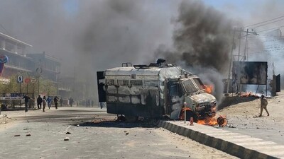 A police vehicle is set on fire during a protest by locals demanding statehood from the government in the high-altitude Leh town of Ladakh region (AP) A police vehicle is set on fire during a protest by locals demanding statehood from the government in the high-altitude Leh town of Ladakh region (AP)
