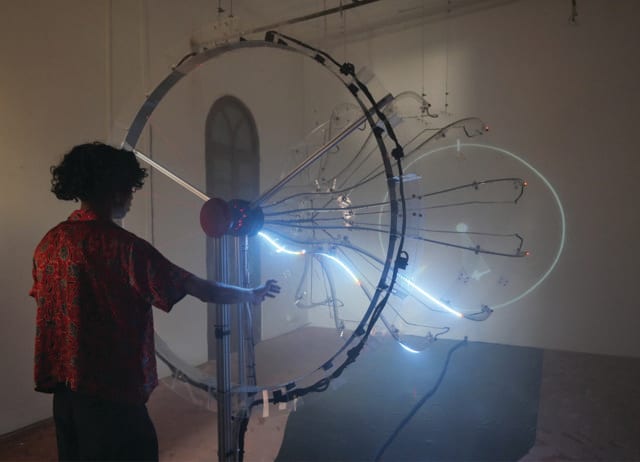 Non-Linear’s Transmissions Into The Void turns hand movements into sound and light. Non-Linear’s Transmissions Into The Void turns hand movements into sound and light.