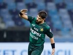 Pakistan's Haris Rauf celebrates the wicket of Indian captain Suryakumar Yadav during their match in the Super Fours
