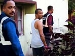 The Special Investigation Team (SIT) detain musician Shekhar Jyoti Goswami from his Garigaon residence.