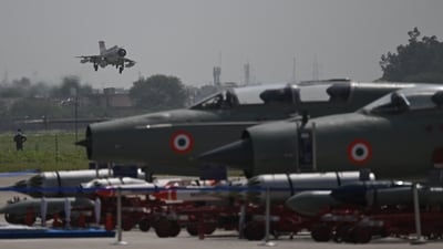 An MiG-21 fighter jet approaches the airstrip at Chandigarh airforce station as it underwent rehearsals ahead of today's culmination ceremony. (Arun Sankar/AFP) An MiG-21 fighter jet approaches the airstrip at Chandigarh airforce station as it underwent rehearsals ahead of today's culmination ceremony. (Arun Sankar/AFP)