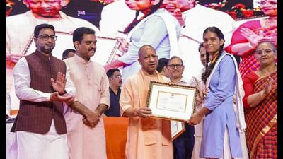 Chief minister Yogi Adityanath during distribution of scholarship to students, in Lucknow. (@CMOfficeUP/X via PTI Photo) Chief minister Yogi Adityanath during distribution of scholarship to students, in Lucknow. (@CMOfficeUP/X via PTI Photo)