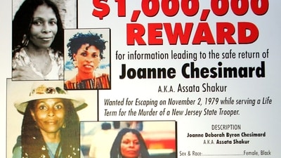 A reward poster announcing the federal bounty for the capture of convicted killer Joanne Chesimard, who used the name Assata Shakur, seen in West Trenton, N.J. on Monday, May 2, 2005. (AP) A reward poster announcing the federal bounty for the capture of convicted killer Joanne Chesimard, who used the name Assata Shakur, seen in West Trenton, N.J. on Monday, May 2, 2005. (AP)