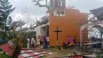 This screen grab taken from UGC video footage courtesy of Facebook user Jerome Martinez taken and received on September 26, 2025 shows people looking at the damage caused by Severe Tropical Storm Bualoi to the Parish of the Immaculate Concepcion Church in Batuan town, Masbate province. (via AFP) This screen grab taken from UGC video footage courtesy of Facebook user Jerome Martinez taken and received on September 26, 2025 shows people looking at the damage caused by Severe Tropical Storm Bualoi to the Parish of the Immaculate Concepcion Church in Batuan town, Masbate province. (via AFP)