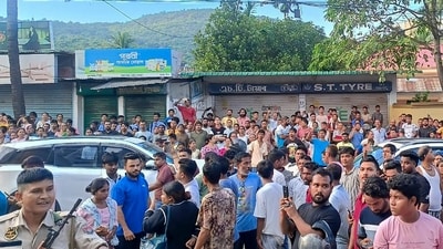 Guwahati: People throng outside the residence of Siddhartha Sharma, manager of music icon late Zubeen Garg. (PTI) Guwahati: People throng outside the residence of Siddhartha Sharma, manager of music icon late Zubeen Garg. (PTI)