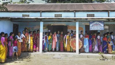 People stand in a queue to cast their votes during the Bodoland Territorial Council (BTC) elections at a polling station at Urahiloga village of Sonitpur district, Assam, on Sept. 22. (PTI) People stand in a queue to cast their votes during the Bodoland Territorial Council (BTC) elections at a polling station at Urahiloga village of Sonitpur district, Assam, on Sept. 22. (PTI)