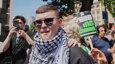 Liam Óg Ó hAnnaidh, aka Mo Chara, a member of the Irish language band Kneecap, leaves Westminster Magistrates Court, London. (File) (AP)