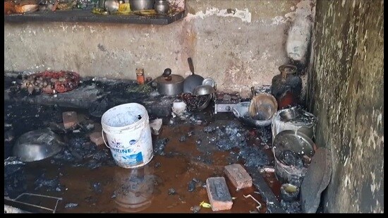 Charred remains of the house where 4our members of a migrant family, including a child, were burnt alive after fire engulfed their single-room accommodation in Vikram Colony of Rajpura in Patiala on Friday. (HT Photo)