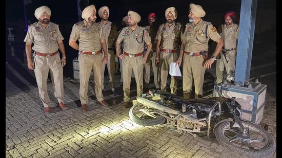 Police at the spot of the encounter in Jalandhar on Friday. (HT Photo)