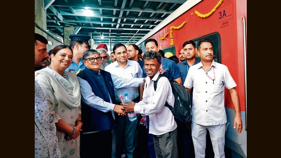 Punjab governor and UT administrator Gulab Chand Kataria, who hails from Udaipur, welcomed the staff and passengers following the train’s arrival in Chandigarh on Friday. (HT File)