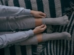 Sleep hack: Warming your feet can be a simple yet effective way to fall asleep faster. (Freepik)