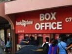 A crowd of people waiting in line to get movie tickets outside a cinema hall. (AFP) A crowd of people waiting in line to get movie tickets outside a cinema hall. (AFP)