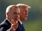 (FILES) Canadian Prime Minister Mark Carney (L) and US President Donald Trump