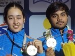 Rashmika Sahgal and Kapil pose with their air pistol mixed team gold medal at the ISSF Junior World Cup in Delhi on Saturday. (HT Photo) Rashmika Sahgal and Kapil pose with their air pistol mixed team gold medal at the ISSF Junior World Cup in Delhi on Saturday. (HT Photo)
