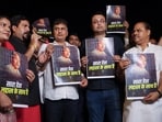 Aam Aadmi Party workers hold a candlelight march over the arrest of environmentalist Sonam Wangchuk at Jantar Mantar, in New Delhi