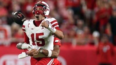 Quarterback Dylan Raiola of the Nebraska Cornhuskers loses the ball as he is sacked by linebacker Jonathan Thompson of the Cincinnati Bearcats. (Getty Images via AFP) Quarterback Dylan Raiola of the Nebraska Cornhuskers loses the ball as he is sacked by linebacker Jonathan Thompson of the Cincinnati Bearcats. (Getty Images via AFP)