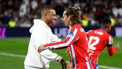 Real Madrid's Kylian Mbappe shakes hands with Atletico Madrid's Antoine Griezmann. (REUTERS)