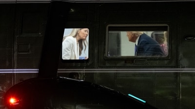 US President Donald Trump speaks with First Lady Melania Trump onboard Marine One after arriving on the South Lawn of the White House (AFP) US President Donald Trump speaks with First Lady Melania Trump onboard Marine One after arriving on the South Lawn of the White House (AFP)