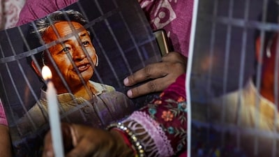 Agitators hold posters and a candle during a protest by AAP over the arrest of climate activist Sonam Wangchuk, at Jantar Mantar, in New Delhi, Friday, Sept. 26, 2025. (PTI Photo/Karma Bhutia) (PTI) Agitators hold posters and a candle during a protest by AAP over the arrest of climate activist Sonam Wangchuk, at Jantar Mantar, in New Delhi, Friday, Sept. 26, 2025. (PTI Photo/Karma Bhutia) (PTI)