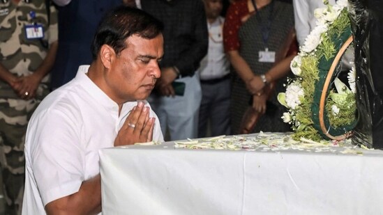 Assam Chief Minister Himanta Biswa Sarma pays tribute to Zubeen Garg at New Delhi Airport on Sunday. (S Lal Singh/ANI)