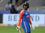 India's Abhishek Sharma walks after losing his wicket.