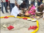 In a unique blend of spirituality and satire, Bengaluru residents performed a "pothole pooja" to draw attention to the city's hazardous road conditions. In a unique blend of spirituality and satire, Bengaluru residents performed a "pothole pooja" to draw attention to the city's hazardous road conditions.