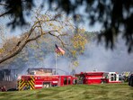 Emergency services respond to a shooting and fire at the Church of Jesus Christ of Latter-day Saints on September 28, 2025 in Grand Blanc, Michigan. Emergency services respond to a shooting and fire at the Church of Jesus Christ of Latter-day Saints on September 28, 2025 in Grand Blanc, Michigan.