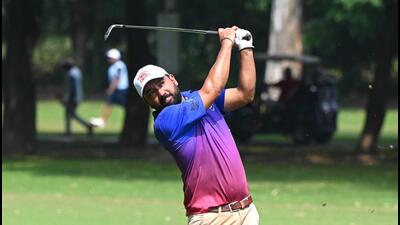 A player in action during Chandigarh Golf League at the Chandigarh Golf Club on Sunday. (Keshav Singh/HT)