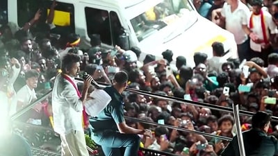 TVK chief and actor Vijay addresses a gathering before a stampede during a public event, in Karur on Saturday. (TVK)