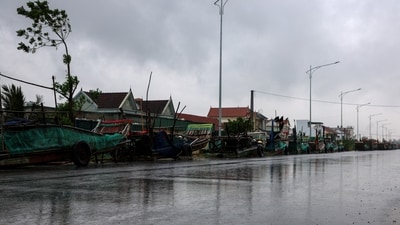 Boats are kept on a road as Typhoon Bualoi nears, in Nghe An province, Vietnam, (REUTERS)