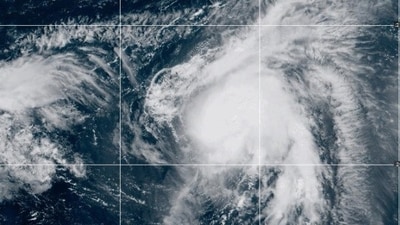 Tropical storm Imelda could form soon while Hurricane Humberto moves towards Bermuda. Warnings have been issued for Florida, (AP) Tropical storm Imelda could form soon while Hurricane Humberto moves towards Bermuda. Warnings have been issued for Florida, (AP)