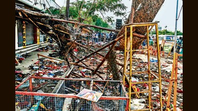 Footwear scattered at the site of the stampede that broke out during TVK chief Vijay’s rally. (AFP) Footwear scattered at the site of the stampede that broke out during TVK chief Vijay’s rally. (AFP)