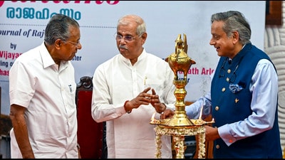 Kerala Governor Rajendra Arlekar, Chief Minister Pinarayi Vijayan and Congress MP Shashi Tharoor during the release of the inaugural edition of Rajahams on Sunday. (PTI) Kerala Governor Rajendra Arlekar, Chief Minister Pinarayi Vijayan and Congress MP Shashi Tharoor during the release of the inaugural edition of Rajahams on Sunday. (PTI)