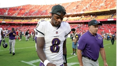 Baltimore Ravens quarterback Lamar Jackson heads off the field following game against the Kansas City Chiefs on Sunday (AP)