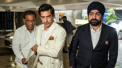Newly-elected BCCI President Mithun Manhas, center, and Treasurer Prabhtej Singh Bhatia, right, arrive for the BCCI Annual General Meeting (AGM). (PTI) Newly-elected BCCI President Mithun Manhas, center, and Treasurer Prabhtej Singh Bhatia, right, arrive for the BCCI Annual General Meeting (AGM). (PTI)