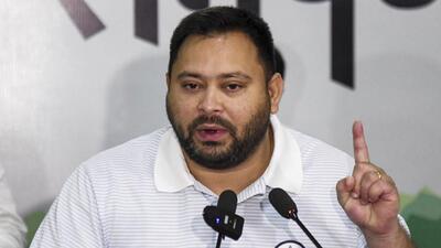 RJD leader Tejashwi Yadav addresses a press conference in Patna on Sunday. (PTI) RJD leader Tejashwi Yadav addresses a press conference in Patna on Sunday. (PTI)