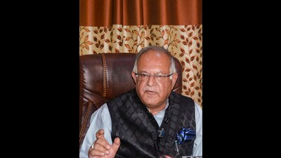 SJammu and Kashmir Pradesh Congress Committee (JKPCC) president Tariq Hameed Karra addresses a press conference at party office, in Srinagar, on Sunday. (PTI)