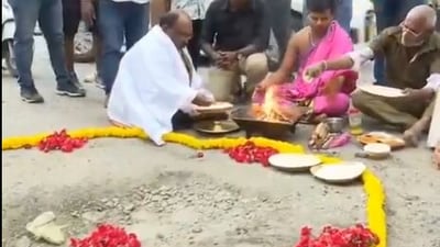 In a unique blend of spirituality and satire, Bengaluru residents performed a "pothole pooja" to draw attention to the city's hazardous road conditions. In a unique blend of spirituality and satire, Bengaluru residents performed a "pothole pooja" to draw attention to the city's hazardous road conditions.